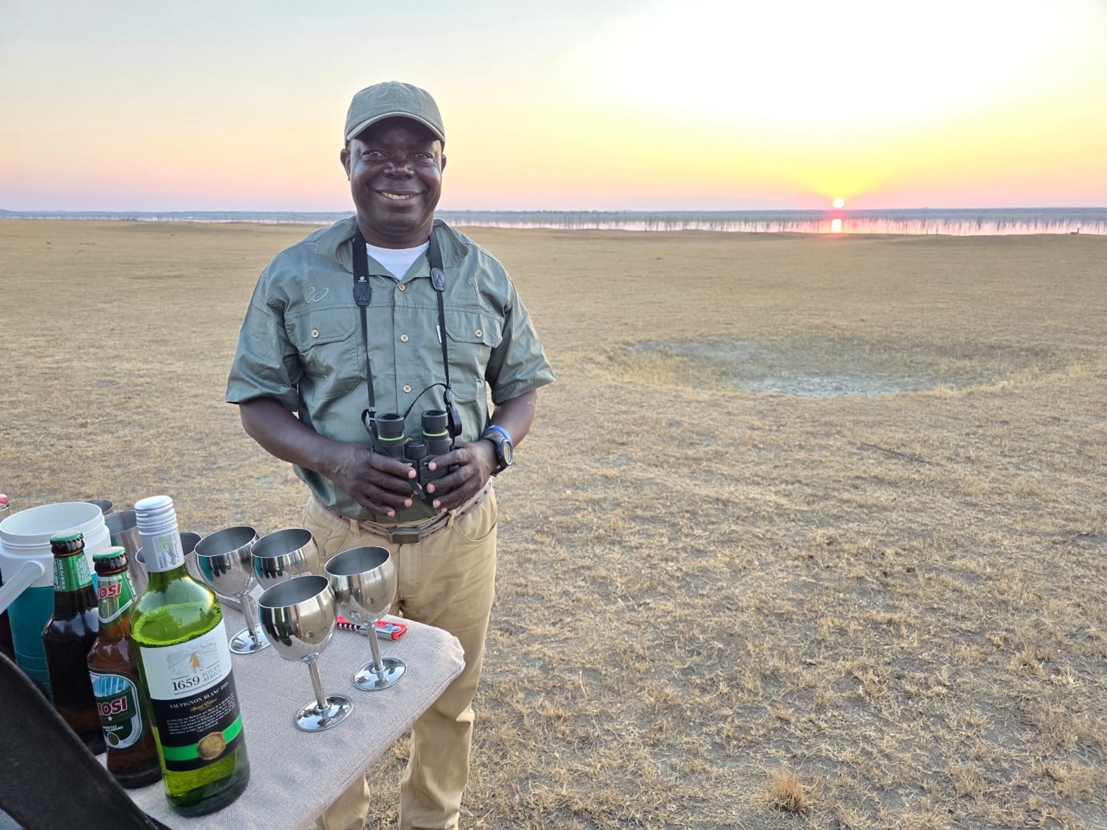 Sundowners at sunset in the Kafue National Park - Lake Camp